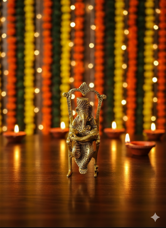 Metal Ganpati on Chair – divine grace in elegant form.